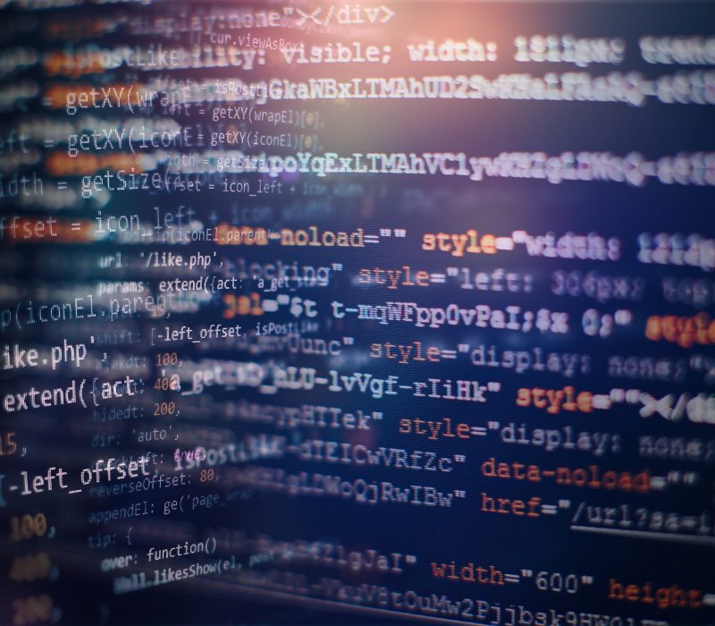 Modern tech. Innovative startup project.WWW software development. Mobile app developer. Innovative startup project. Digital technology on display. HTML5 in editor for website development. Website HTML Code on the Laptop Display Closeup Photo.